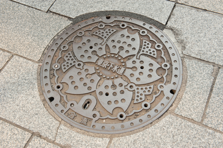 cherry blossom sewage cover