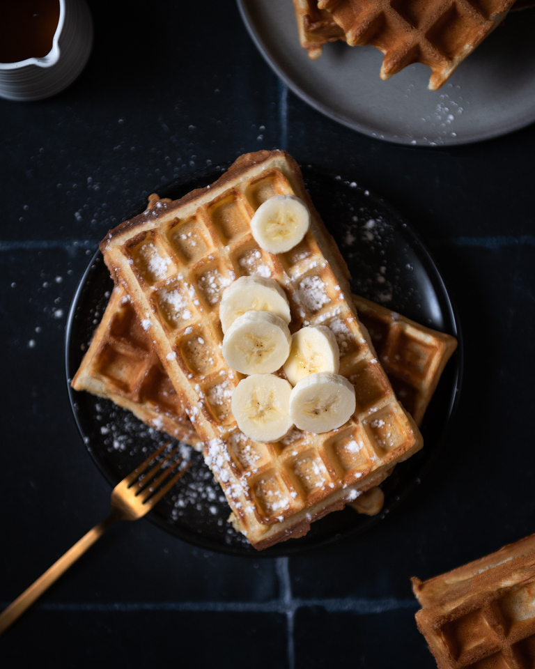 Flatlay of Waffles( Gaufres) on a black tile counter