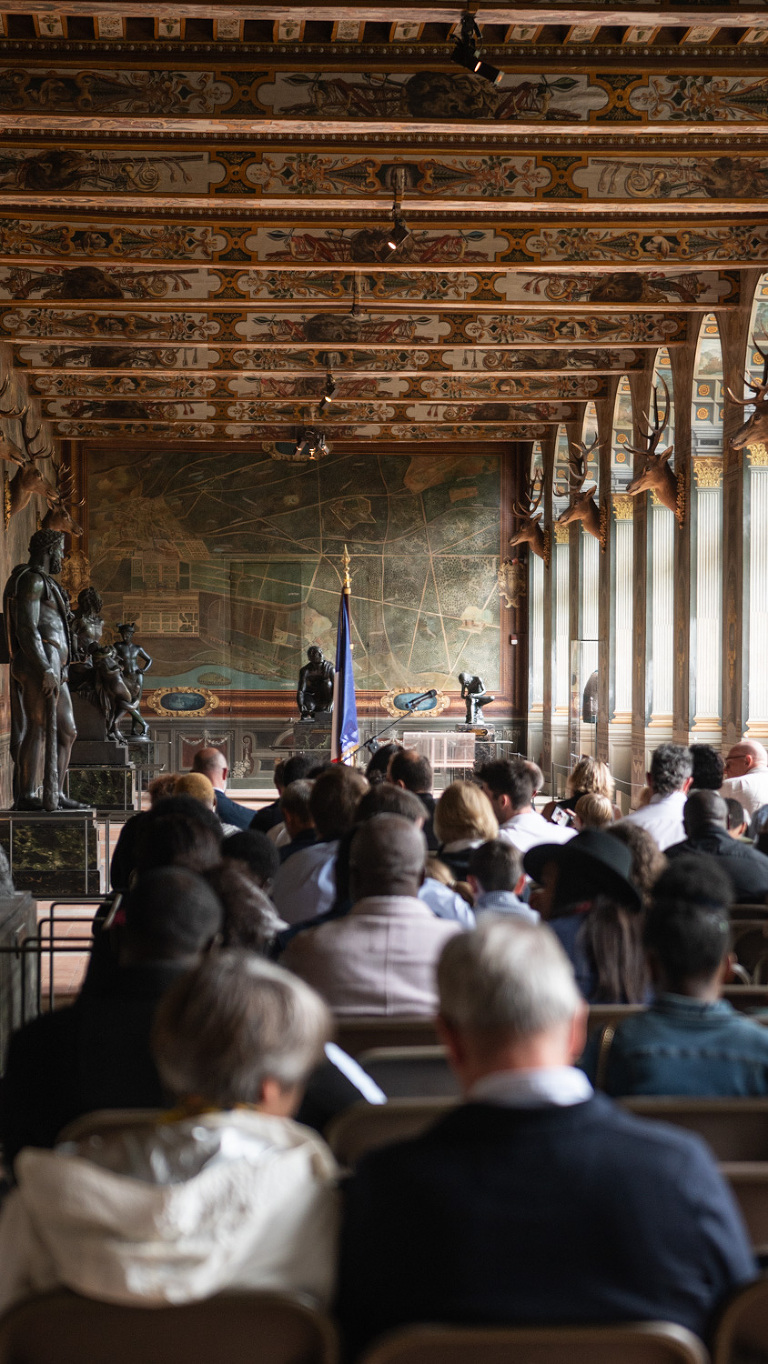 The crowd at my French citizenship ceremony in the Chateau de Fontainebleau